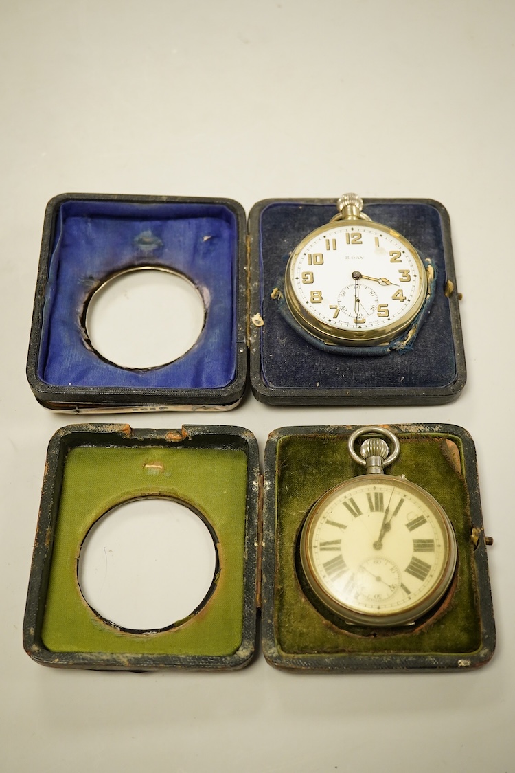 Two George V silver mounted travelling watch cases, both Birmingham, 1921, both containing chrome cased pocket watches. largest case 11.4cm.